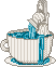 teacup with a marble statue and flowing water